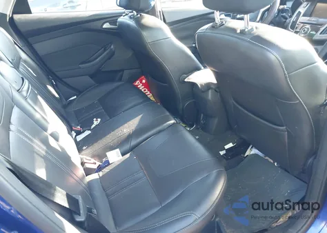 2013 Ford Focus Titanium z USA, uszkodzony, nr VIN 1FADP3N22DL128971